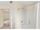 Bright bathroom showcasing a shower-tub combination at 10437 Coyote Cub Ave, Las Vegas, NV 89129
