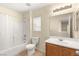 Bathroom featuring shower-tub combination, sink, and toilet at 10437 Coyote Cub Ave, Las Vegas, NV 89129