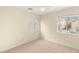Bedroom featuring neutral carpeting, natural light and window with blinds at 10437 Coyote Cub Ave, Las Vegas, NV 89129