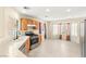 Well-equipped kitchen with stainless steel appliances, tile floors, and great natural light at 10437 Coyote Cub Ave, Las Vegas, NV 89129