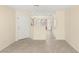 Bright living room with tile flooring, recessed lighting, neutral walls, and entry way at 10437 Coyote Cub Ave, Las Vegas, NV 89129