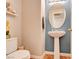 Cozy half-bathroom with a pedestal sink, stylish fixtures, and appealing colors at 10645 Lace Vine Arbor Ave, Las Vegas, NV 89144