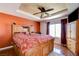 Spacious bedroom with a decorative ceiling, a large window, and ample natural light at 10645 Lace Vine Arbor Ave, Las Vegas, NV 89144