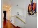 Upper level hallway featuring hardwood floors and decorative touches at 10645 Lace Vine Arbor Ave, Las Vegas, NV 89144