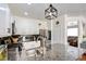Well-appointed kitchen with granite countertops, stainless steel appliances, and a convenient breakfast bar at 10645 Lace Vine Arbor Ave, Las Vegas, NV 89144