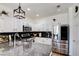 Stylish kitchen with stainless steel appliances, granite countertops, and white cabinetry at 10645 Lace Vine Arbor Ave, Las Vegas, NV 89144