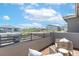 Balcony featuring outdoor seating and a beautiful view of neighboring properties at 11756 Emerald Lake Ave, Las Vegas, NV 89138