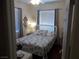 Comfortable bedroom with a queen-sized bed, soft lighting, and a relaxing atmosphere at 11832 Arenoso Dr, Las Vegas, NV 89138