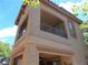 Charming two-story home with a balcony, showcasing an appealing architectural design at 11832 Arenoso Dr, Las Vegas, NV 89138