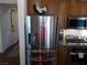 Stainless steel refrigerator with decor, cabinets, and under cabinet lighting at 11832 Arenoso Dr, Las Vegas, NV 89138