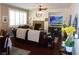 Inviting living room features a cozy fireplace and dark wood floors at 11832 Arenoso Dr, Las Vegas, NV 89138