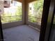 Inviting outdoor patio featuring decorative railing with views of lush greenery at 11832 Arenoso Dr, Las Vegas, NV 89138