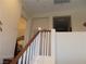 Stairway leading to the second floor, showcasing a bright and inviting hallway at 11832 Arenoso Dr, Las Vegas, NV 89138