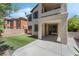 Manicured backyard featuring a cozy patio with an outdoor living area at 11900 Calle De Sol Dr, Las Vegas, NV 89138