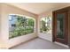 Covered balcony overlooking the greenery outside at 11900 Calle De Sol Dr, Las Vegas, NV 89138