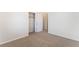 Neutral bedroom features plush carpet, ample closet space, and bright natural light at 11900 Calle De Sol Dr, Las Vegas, NV 89138