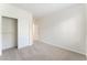 Spacious bedroom with plush carpet, ample closet space, and bright natural light at 11900 Calle De Sol Dr, Las Vegas, NV 89138