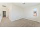 Bright bedroom with neutral carpet and natural light from the window at 11900 Calle De Sol Dr, Las Vegas, NV 89138