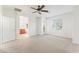 Spacious main bedroom with ensuite bath, carpeted floors, and natural light at 11900 Calle De Sol Dr, Las Vegas, NV 89138