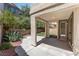 Charming outdoor patio featuring lush landscaping and access to outdoor living at 11900 Calle De Sol Dr, Las Vegas, NV 89138