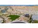 Expansive aerial view of community gathering space with mountain backdrop and open desert at 12382 Tudor Arch Dr, Las Vegas, NV 89138