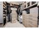 Organized walk-in closet with custom shelving and drawer system at 12382 Tudor Arch Dr, Las Vegas, NV 89138