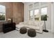 Bright living room with a comfortable sectional sofa, stylish lighting, and modern decor at 12382 Tudor Arch Dr, Las Vegas, NV 89138