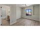 Bedroom with a modern bathroom and a window view of the neighborhood at 17 Winding Rd, Henderson, NV 89052