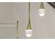 A close-up view of a chandelier with tear-drop-shaped glass at 17 Winding Rd, Henderson, NV 89052