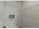 A walk-in closet with metal storage racks and ample storage space at 17 Winding Rd, Henderson, NV 89052
