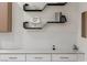 Stylish floating shelves with modern decor add a touch of elegance to this kitchen at 17 Winding Rd, Henderson, NV 89052