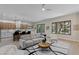 Spacious living room, open floor plan, with backyard views and modern finishes at 17 Winding Rd, Henderson, NV 89052