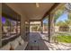 Covered patio featuring a ceiling fan and spiral staircase at 17 Winding Rd, Henderson, NV 89052