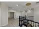Second floor landing area featuring an ornate chandelier and access to other rooms at 17 Winding Rd, Henderson, NV 89052