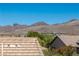 Mountain view over the houses in the neighborhood at 17 Winding Rd, Henderson, NV 89052