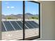 A great window view that looks out to the desert mountains and neighborhood at 17 Winding Rd, Henderson, NV 89052