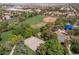 Overhead view of a community park featuring a baseball field, basketball court, volleyball court and covered picnic area at 1839 Thunder Mountain Dr, Henderson, NV 89012