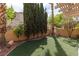 Backyard with artificial turf and privacy landscaping at 1839 Thunder Mountain Dr, Henderson, NV 89012