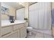 Bathroom with neutral colored tile flooring and shower curtain at 1839 Thunder Mountain Dr, Henderson, NV 89012