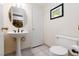 Powder room with pedestal sink and tile flooring at 1839 Thunder Mountain Dr, Henderson, NV 89012