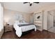 This bright bedroom features dark wood floors and an alcove bookcase at 1839 Thunder Mountain Dr, Henderson, NV 89012