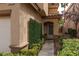 Home featuring a charming entryway with decorative green foliage and a cozy, inviting appeal at 1839 Thunder Mountain Dr, Henderson, NV 89012