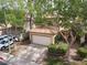 Charming two-story home features a tile roof, attached garage, and well-maintained landscaping at 1839 Thunder Mountain Dr, Henderson, NV 89012