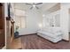 Cozy living room with hardwood floors, a fireplace, and comfortable seating at 1839 Thunder Mountain Dr, Henderson, NV 89012