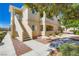 Attractive condo complex with well maintained landscape, sidewalks, and stairway leading to upper units at 1881 W Alexander Rd # 1092, North Las Vegas, NV 89032