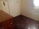 Basement space offering potential for storage or customization, with unique flooring at 192 W Alma Ave, Overton, NV 89040