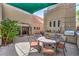 Backyard with outdoor kitchen, grill, and ample seating for relaxing and entertaining at 2017 Slow Wind St, Las Vegas, NV 89134
