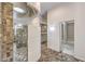 Bathroom featuring tile, shower, sink, and walk-in closet at 2017 Slow Wind St, Las Vegas, NV 89134