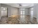 Open living area with stone tile flooring, recessed lighting, and fan at 2017 Slow Wind St, Las Vegas, NV 89134