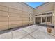 Private patio with sliding glass doors, offering seamless indoor-outdoor living at 2017 Slow Wind St, Las Vegas, NV 89134